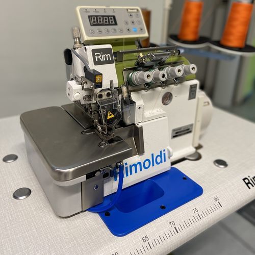 Machine à coudre automatique - PL27-X026-F10 - RIMOLDI - point de surjet / à deux aiguilles / à 3 fils