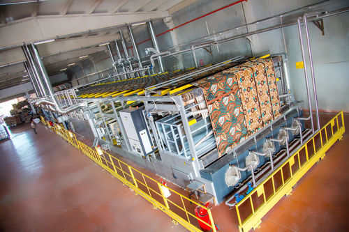 Machine d'enduction ou de complexage d'adhésif - Vandewiele - pour textiles