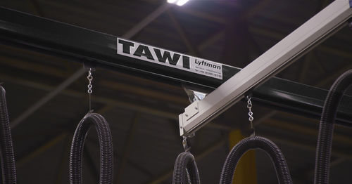 Grue fixe - TAWI - télescopique / pour chantier / de levage