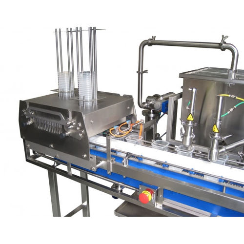 Ligne de remplissage automatique - Riggs Auto Pack Ltd - pour crème / pour produits alimentaires / de liquides
