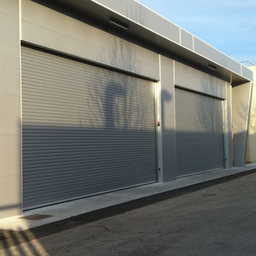 Porte levante-coulissante - Tecno Teck - Tecnoindustriale s.r.l. - pour l'intérieur / isolée