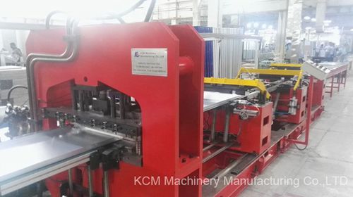 Ligne de profilage pour panneaux - KCM Machinery Manufacturing - automatique / poinçonnage / avec convoyeur à rouleaux
