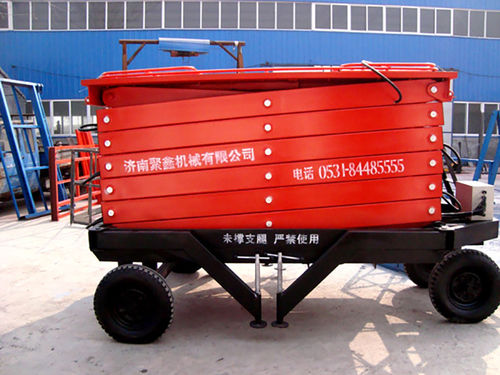 Nacelle élévatrice à ciseaux à roues - a11001 - Jinan Juxin Machinery Co., Ltd. - pour usage intérieur et extérieur / tout terrain / pour applications industrielles