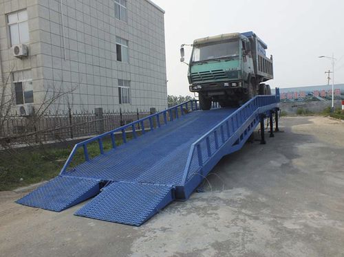 Rampe de chargement de manutention - a1000 series - Jinan Juxin Machinery Co., Ltd. - mobile / fixe / conteneur