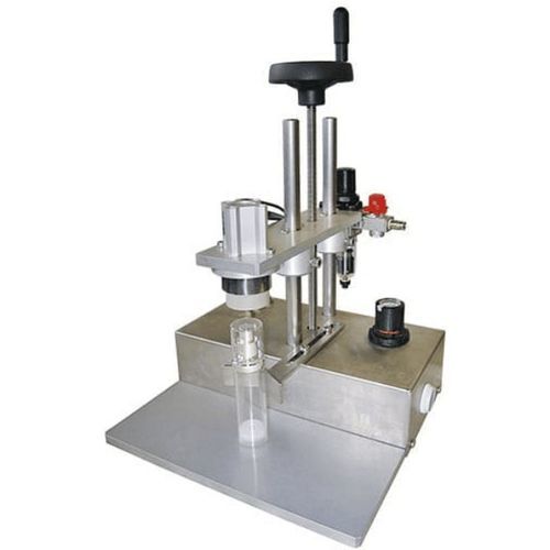 Capsuleuse emmanchée à la presse - Adelphi - pneumatique / semi-automatique / pour l'industrie pharmaceutique