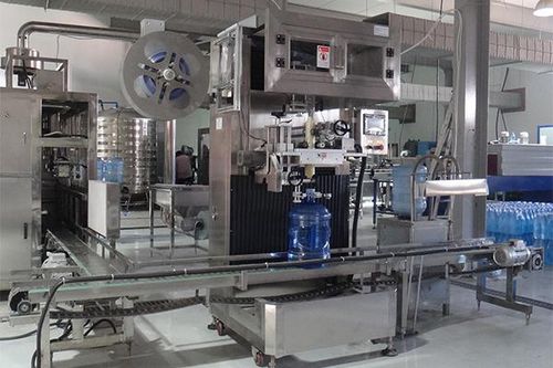 Système d'étiquetage automatique - JND-100N - Shenzhen J&D Drinking Water equipment Co Ltd - pour bouteilles / de pot / par manchon thermo-rétractable
