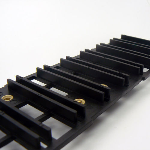 Surmoulage d'insert métallique - A.G.C. BUSINESS CONSULTING S.A. - polycarbonate / pour l'électronique