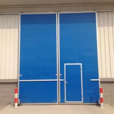 Porte coulissante - Shanghai Kenvo Door Co., Ltd - en acier / industrielle / pour l'extérieur