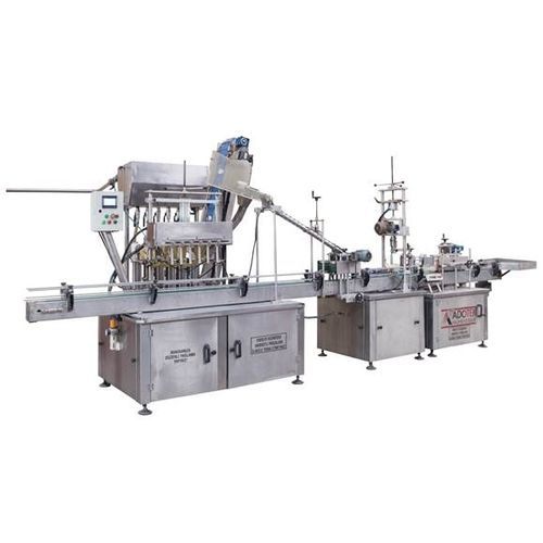 Remplisseuse volumétrique - ADK 303 - Adotek Machine - automatique / de bouteilles / pour produits alimentaires