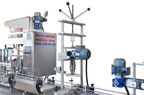 Capsuleuse rotative - ADK 311 - Adotek Machine - totalement automatique / pour bouteilles / en ligne