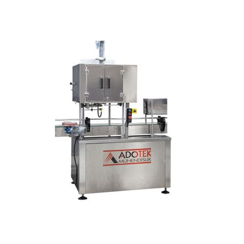Système d'étiquetage automatique - ADK 309 - Adotek Machine - pour bouteilles / pour l'industrie agroalimentaire / pour applications cosmétiques