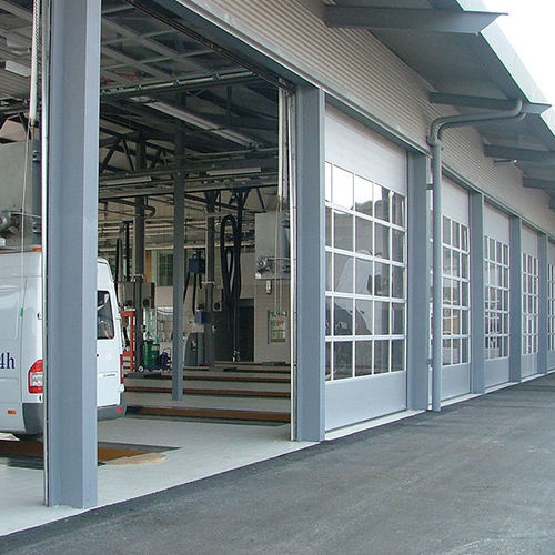 Porte sectionnelle - iCat® - Rsa kapi LTD - en métal / en aluminium / pour l'extérieur