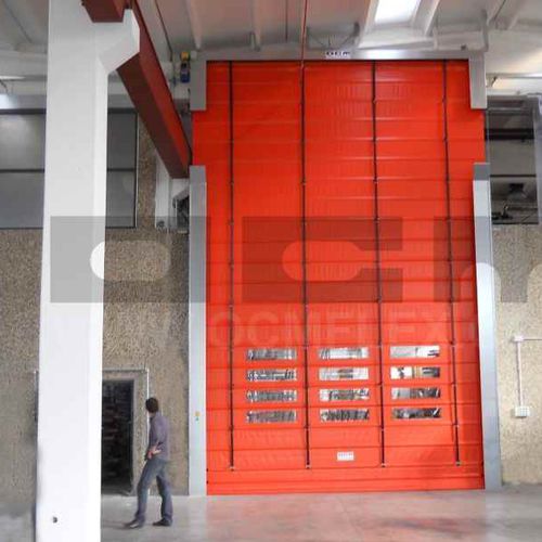 Porte pliante - OCM Industrial Doors - pour l'intérieur / pour pont roulant