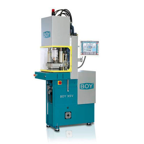 Presse à injecter verticale - XS V - Dr. Boy - hydraulique / à deux plateaux / pour pièces avec insert