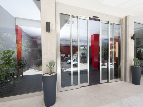 Porte coulissante - T.O.S. 4 - Ponzi - battante / en verre / pour l'extérieur