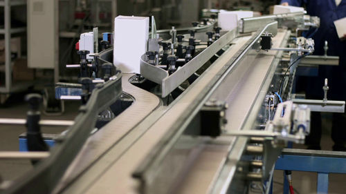 Palettiseur pour carton - Sinterpack - robotisé / pour caisses / automatique