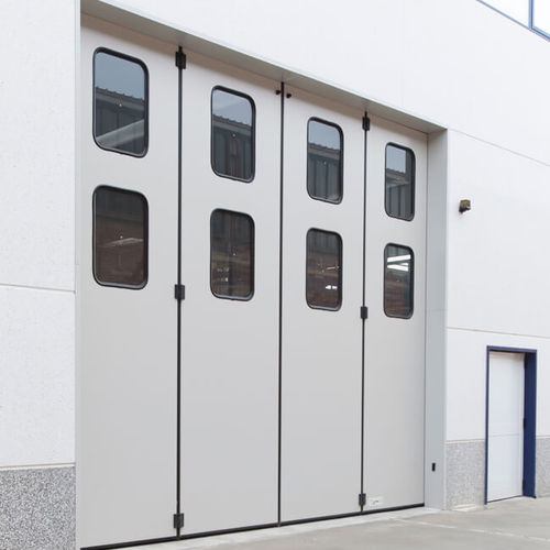 Porte pliante - PERSEO - IRIDIUM DOORS - en acier galvanisé / vitrée / pour l'extérieur