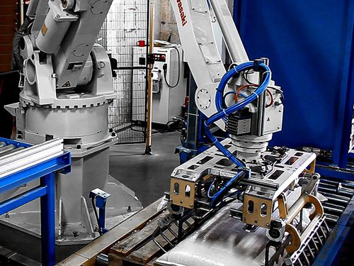 Palettiseur robotisé - TES STM GROUP - de sacs / de manutention / automatique
