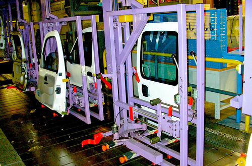 Système de manutention pour porte coulissante - Coutier Industrie - pour porte / de process / pour l'industrie automobile