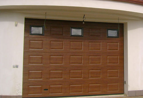 Porte sectionnelle - Traditional style - KOPRON SPA - en métal / en bois / pour garage