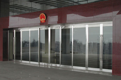 Porte coulissante - Shen Zhen Hui Trade Industry Co., Ltd. - en métal / pour l'extérieur / automatique