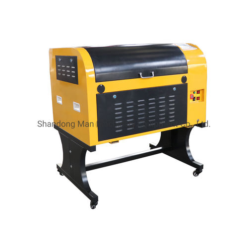 Machine de gravure de découpe - MAN-6090 - Shandong Man Machinery Equipment Co., Ltd. - laser à fibre / pour textiles / CNC