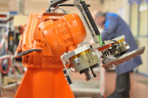 Ligne de production de pièces en métal - DAM Group - robotisée