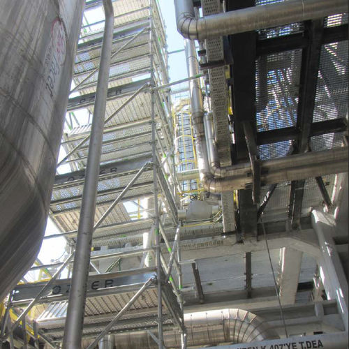 Échafaudage fixe - UNISCAFF - OZLER FORMWORK AND SCAFFOLDING SYSTEMS - de façade / modulaire