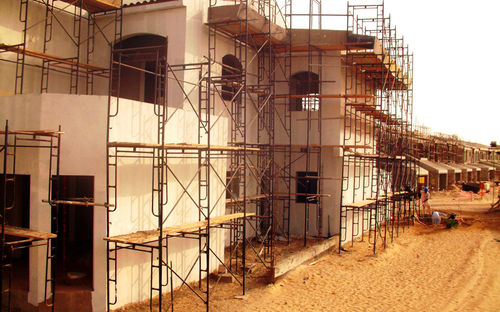 Échafaudage fixe - SCAFFCO - de façade / modulaire / pour montage en escalier