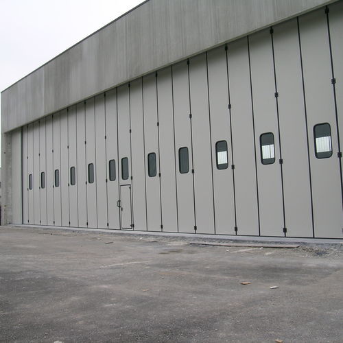 Porte industrielle - Moreschi Chiusure Industriali S.r.l. - pliante / en acier galvanisé / classe 4