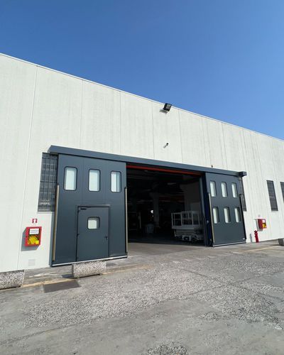 Porte coulissante - Moreschi Chiusure Industriali S.r.l. - en acier galvanisé / pour l'intérieur / isolée