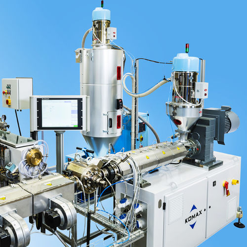 Ligne d'extrusion multicouche - KOMAX - avec refroidissement à eau / monocouche / avec unité d'impression en ligne
