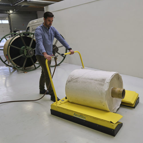 Déplaceur de rouleaux pour équipement de manutention - Aerofilm Systems - de film plastique / pour enrouleur de câble / pour bobine d'acier