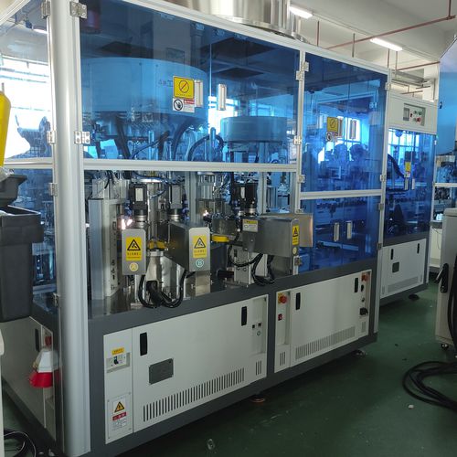 Capsuleuse à double tête - SZZ-109SH - Shenzhen xinzhong plastic - à mouvement continu / servocommandée / automatique