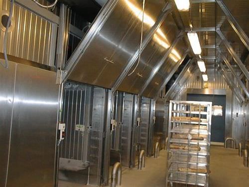 Porte coulissante verticale - AV0601K - DAN-doors - en métal / pour chambre froide / industrielle
