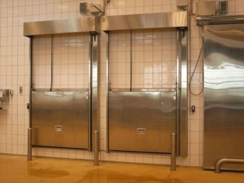 Porte coulissante verticale - AV1001F - DAN-doors - en métal / pour chambre froide / industrielle