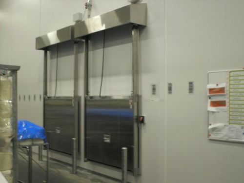 Porte coulissante verticale - MV0601K - DAN-doors - en métal / pour chambre froide / industrielle