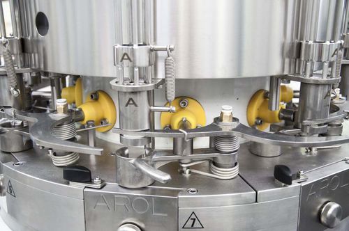 Capsuleuse rotative - SATURNO - AROL Closure systems - multitête / automatique / pour bouteilles en verre