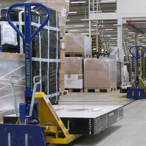 Convoyeur à chaînes - DEMATIC - de transport / de manutention / de distribution