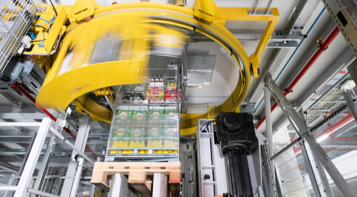 Système de palettisation robotisé - DEMATIC - couche par couche / de caisse / pour étagère