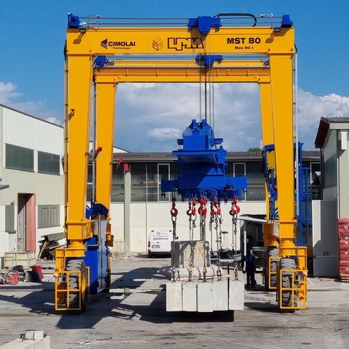 Chariot cavalier pour poutres préfabriquées en béton - MST 80 - CIMOLAI TECHNOLOGY SpA - pour charges lourdes / sur pneus