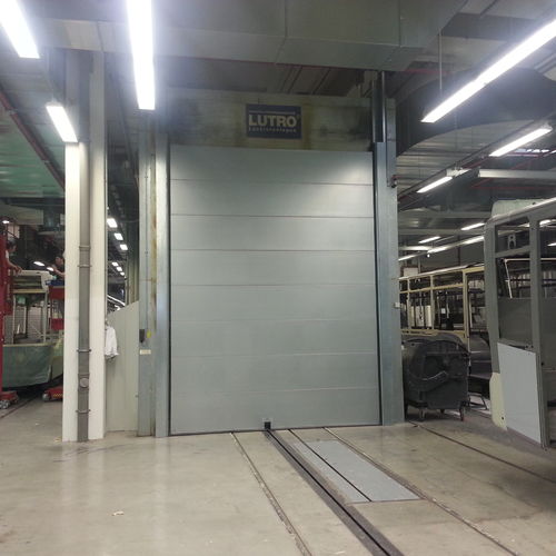 Porte résistante à la chaleur - Jansen Tore GmbH & Co.KG - sectionnelle / en métal / industrielle