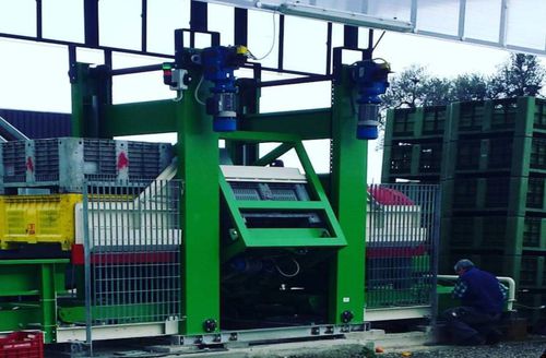 Basculeur hydraulique - ERCOLE - Cosmecal srl - de palettes / fixe / pour l'industrie agroalimentaire