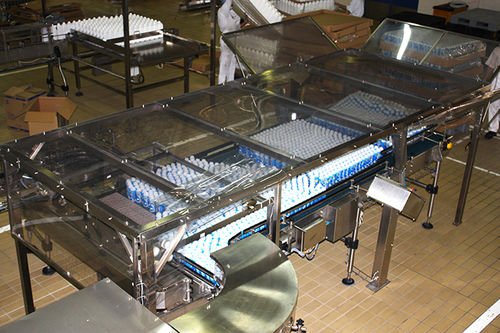 Dessacheuse automatique - Technica International - pour bouteilles en plastique