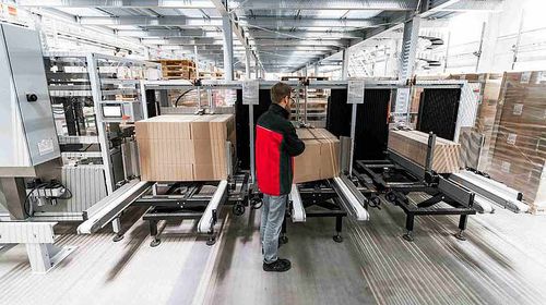 Système de préparation de commande PTL - SMB International GmbH - pick-by-voice / pick-by-scan