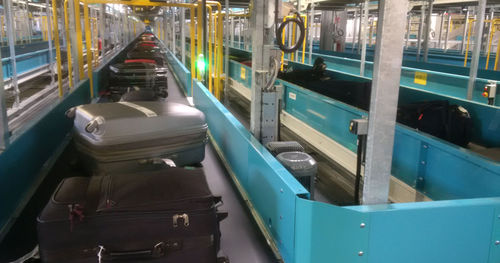 Système de convoyage de bagages - LEONARDO SPA - pour intralogistiques flexibles