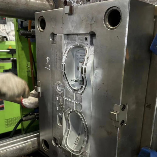 Moule d'injection plastique bi-matière - Shenzhen MJX Plastic Mold Co.,Ltd - multi-empreintes / surmoulage / mono-empreinte