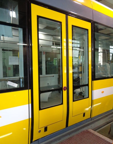 Porte de train coulissante - ŽOS 4 TRAINS - électrique / pour tramways / d'entrée