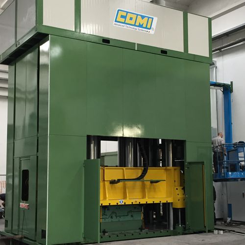 Presse à compression - COMI GROUP - hydraulique / pour matériaux composites / à cadre