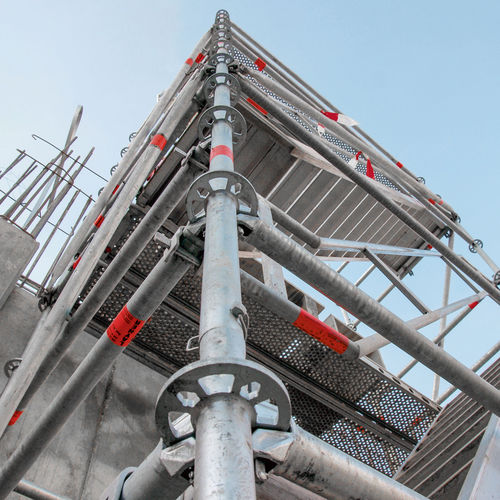 Tour d'échafaudage fixe - MTT - MEVA Schalungs-Systeme - de façade / modulaire / avec escaliers